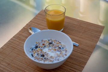 Muesli and orange juice breakfast
