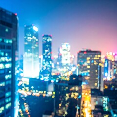 Blurred nighttime cityscape, glowing skyscrapers