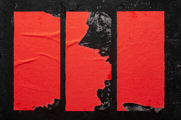 Fototapeta na wymiar Close-up of scraps of Red posters.
