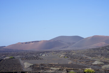 volcanic landscape, clear blue sky at Lanzarote, Canary Islands&rdquo;