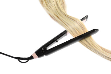Straightener with blonde hair lock isolated on white