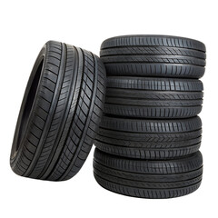Obraz premium A set of five black car tires. Four of the tires are stacked neatly on top of each other, forming a vertical column. The fifth tire is positioned to the left of the stack.