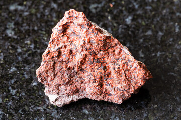 sample of raw analcimolite mineral on black