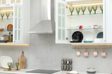Different dishware, glasses and other kitchen utensils indoors