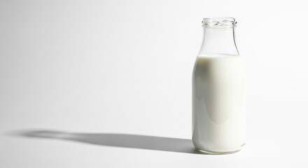 A retro-style milk bottle, open and full, representing natural dairy products and healthy nutrition.