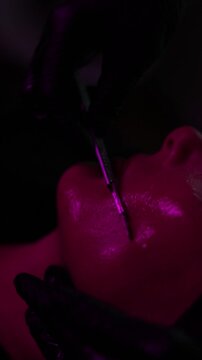 woman receiving dermaplaning in spa
