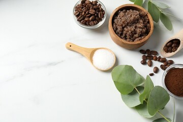 Natural body scrub and ingredients on white table, flat lay. Space for text