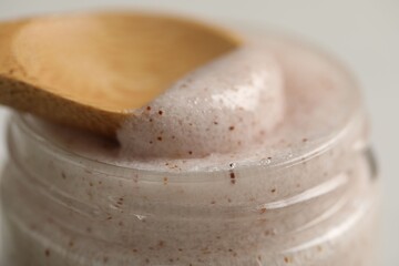 Natural body scrub on white table, closeup