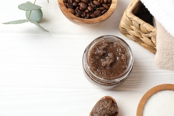 Natural body scrub, ingredients and towels on white wooden table, flat lay. Space for text