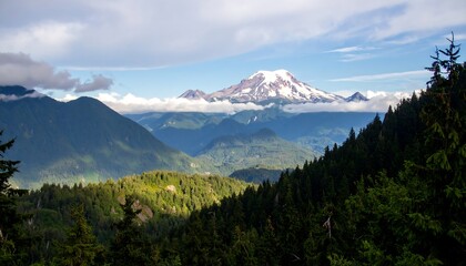 Fototapeta premium Mountain vista, snow-capped peak, lush forests