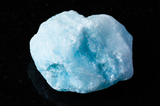 sample of raw blue aragonite mineral on black