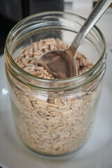 Healthy overnight oats with chia seeds and fruit served in a glass jar