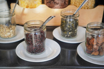 Tray with jars of spices and condiments ready for serving or storage