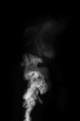 White smoke swirling upwards in dark atmosphere captured in monochrome style. Swirling, writhing smoke to overlay on your photos. Steam explosion special effect. Halloween design