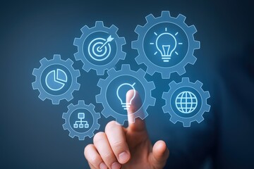 Business strategy and innovation depicted with gears and hand, showcasing teamwork, solutions, and technological advancement