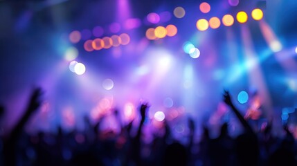 The vibrant concert scene with glowing lights and energetic crowd hands.