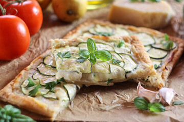 Zucchini puff pastry tart with mozzarella and cream cheese
