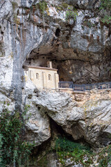 Covadonga in Asturias is a historic mountain village known for its sacred cave, basilica, and stunning natural surroundings.