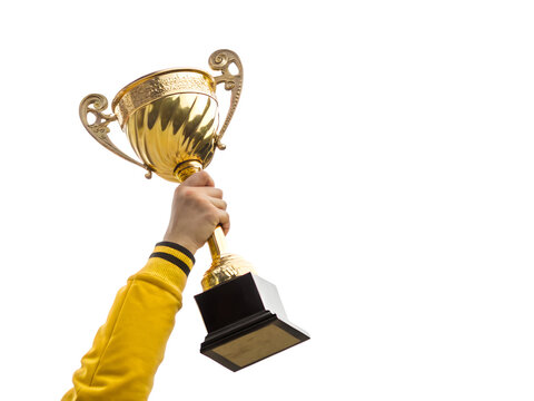 Hand in yellow sleeve holding up a golden trophy isolated on transparent background - Powered by Adobe