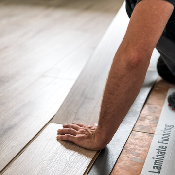 Installation of a new laminate floating floor in the house