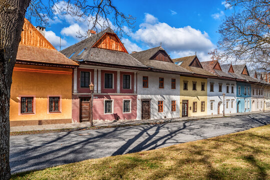 Colorful historical houses in row at Spisska Sobota district of Poprad Slovakia with blue sky and spring sunlight