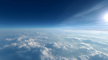Naklejka premium Magnificent Aerial View of Clouds Under a Bright Blue Sky