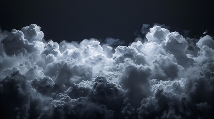 A black and white image of a cumulus clouds with a dark sky in the background