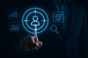 Fototapeta premium Person touches digital target with user icon and analytics data icons technology interface