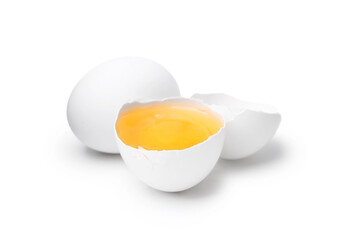 Whole and broken chicken eggs isolated on white