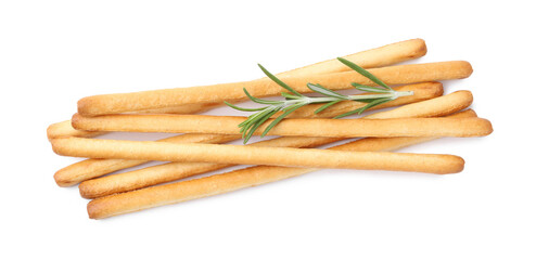 Delicious grissini sticks with rosemary isolated on white, top view