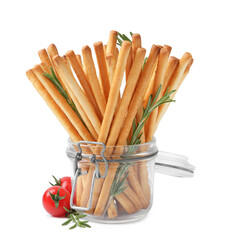Delicious grissini sticks with rosemary and fresh tomatoes isolated on white