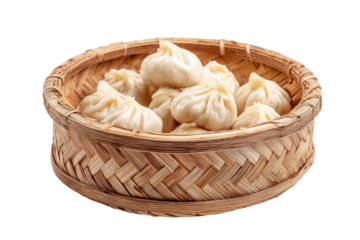 Steamed dumplings in a woven bamboo basket isolated on a transparent background food