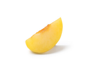 Piece of yellow cherry plum isolated on white