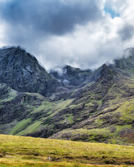 Viewing Carrauntoohill mountain peak shrouded in clouds on popular walkway, Ireland.