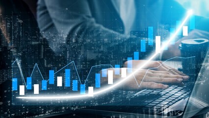 A business professional reviews financial data on a laptop, surrounded by glowing charts and graphs that symbolize growth and success in a vibrant urban environment. Copula