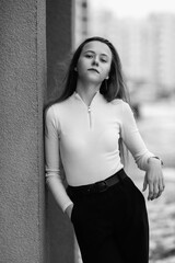 Portrait of a young beautiful long-haired girl outdoors in winter.