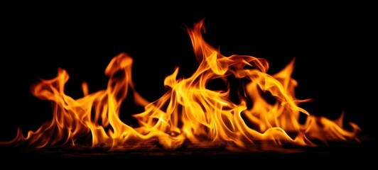 The Dancing Flames of a Fiery Blaze Against a Dark Background.