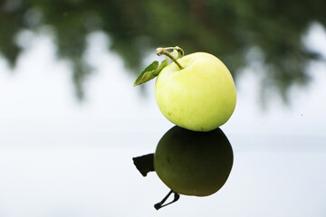 Green apple close-up on a napkin.