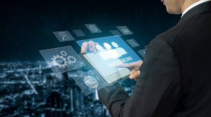 Outsourcing concept showing collaboration, delegation, global workforce, productivity, and task management through remote teams and external service providers Vouch