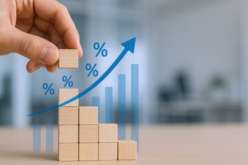 Interest Rate Increase Concept: Hand Stacking Wooden Blocks Forming Rising Chart with Percentage Symbols
