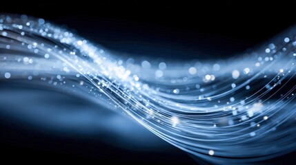 Abstract Blue Light Trails Flowing with Sparkling Particles on Dark Background, Modern Technology Design
