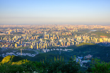 Overlooking Beijing cityscape at sunset from Western Hills