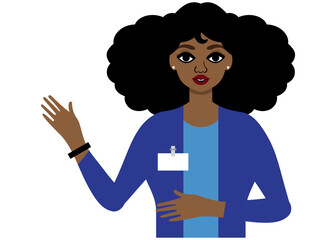 woman with name tag in cardigan holding her hand up