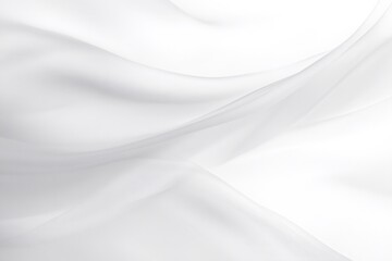Obraz premium Soft white fabric creating elegant waves on a minimalist white background, perfect for fashion, beauty or design projects