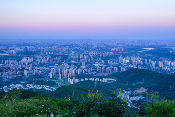 Obraz premium Overlooking Beijing cityscape and Venus Belt at night from Western Hills