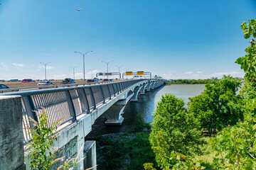Potomac River crossing on the Woodrow Wilson Memorial Bridge. Scenic urban infrastructure with...