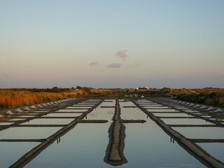 Salt mounds and pans at the break of dawn