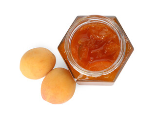 Tasty apricot jam in jar and fresh fruits isolated on white, top view