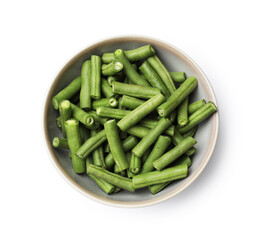 Pieces of fresh pea pods in bowl isolated on white, top view
