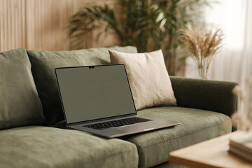 blank laptop screen in modern room	